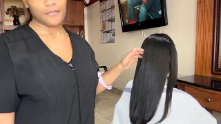 How to use a round brush to blow out natural hair, trim and silk press