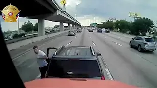 Houston driver stops in middle of freeway, gets out of SUV, swings at truck driver