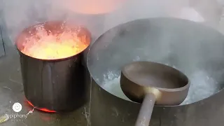 epiphany glass - Pouring Molten Glass Into Water To Empty The Furnace.