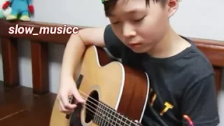 Despacito ( fingerstyle guitar arranged cover by 10 year _ old kid sean )