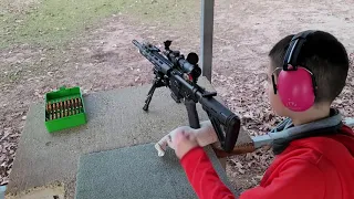 Wyatt shooting at 100 yards with the Leopold 1.5-4X Pig Plex