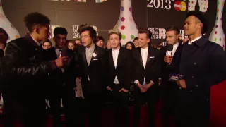 On the Red Carpet: Rizzle Kicks talk to One Direction | BRITs 2013