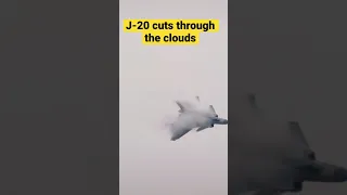 J-20 cuts through the clouds. Chinese stealth fighter.