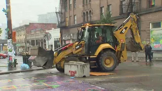 Crews begin removing barriers around Seattle’s ‘CHOP’