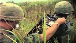 U.S. soldier with E63 personnel detector, receives maintenance assistance from an...HD Stock Footage