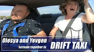 Olesya and Yevgen scream together in drift taxi