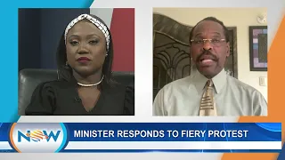 Minister Responds To Fiery Protest