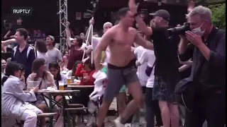 England fans celebrating Kane’s goal in a Berlin fanzone