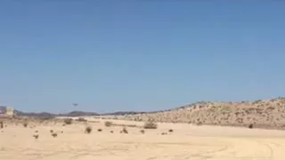 OV-10 Bronco  /  low pass on giant rock dry lake bed