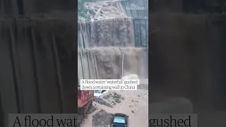 Flooding causes 'waterfall' in Chongqing in China
