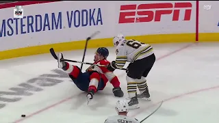 Brad Marchand clean check on Matthew Tkachuk