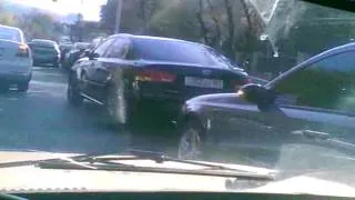 Second lane parkings in front of Pushkin school in Yerevan cause traffic jam