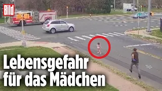 Friseure retten Mädchen von Kreuzung