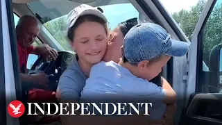 Ukrainian children reunited with mother more than a year after being taken 'illegally' to Russia