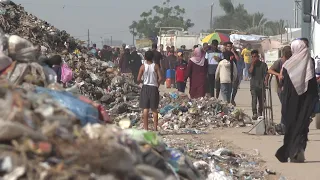 Displaced Palestinians in Muwasi camp face health risks as garbage piles up