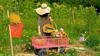 Diligent homemaker in the summer countryside / Simple life / Cooking with vegetables in the garden