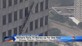 Workers rescued from scaffolding outside 71st floor of tower