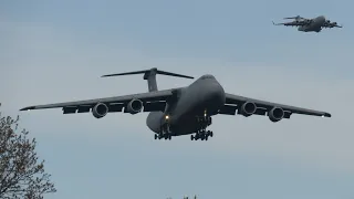 C-5 Super Galaxies and other military planes landing and taking off towards each other ✈️