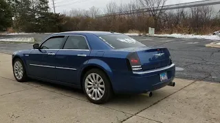 CHRYSLER 300C DESTROYS PAVEMENT WITH A BURNOUT THEN DISAPPEARS