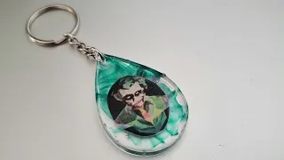@giamac969 resin keychain with swirl background.