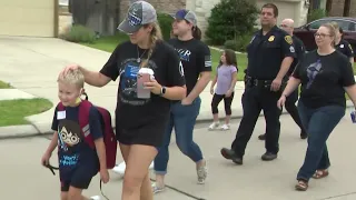 Police give son of HPD officer killed in helicopter crash touching escort to first day of school