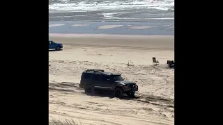 Jeep Commander trips ocean.