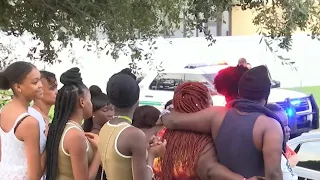 Family holds vigil for murdered mother