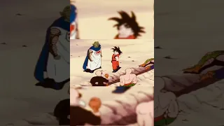 Goku gives Piccolo a senzu bean