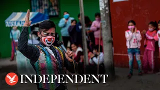 Live: Clowns parade through Lima's streets for Peruvian Clown Day