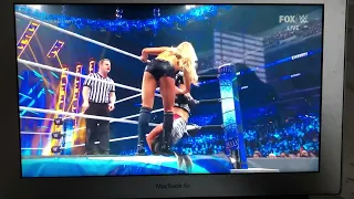 Charlotte Flair teaches Toni storm a lesson.