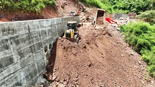 Impressive Nature of the Video Truck Bulldozer Team Takes a Detour On Mountain Road Building