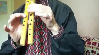 Double flute - ukrainian ethnic instrument dvodencivka, djolomyga. Ukranian folk Song Perelaz