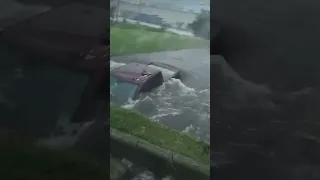 A couple of good Samaritans assist in the rescue of a driver trapped in a truck ￼