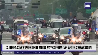 S.Korea's new President Moon waves from car after swearing in