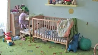 Teri escaping from the crib (17 months old)