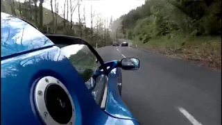 Elise and Exige S on curvy road