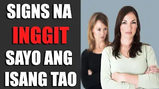 7 Signs na Palihim na Na-iinggit ang Isang Tao