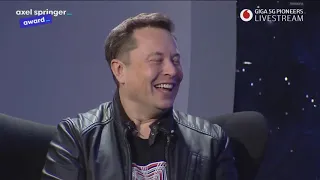 Elon Musk accepts prestigious Axel Springer Award.