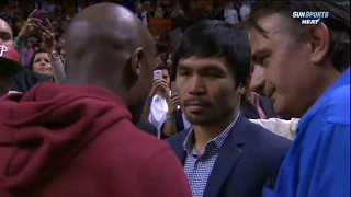 Floyd Mayweather & Manny Pacquiao face off at the Bucks vs Heat game