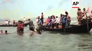 A river ferry carrying up to 140 passengers capsized in central Bangladesh on Sunday after being hit