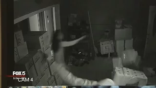 Security video shows woman defend herself against armed intruders