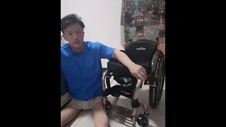 handsome Chinese T-3 complete paraplegic guy floor transfer