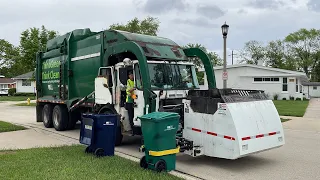 WM McNeilus Contender Garbage Truck With A White Curotto Can