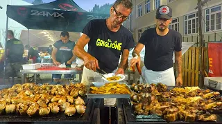 Italy Street Food. Ribs, Sausages, Chicken and more Meat Roasted on Huge Grills