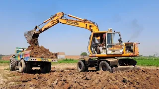 Mega Excavator fully Loading Mud in Tractor with Trolly