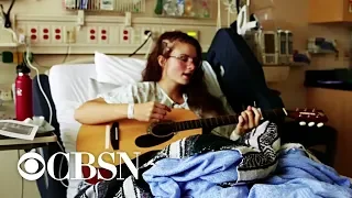 Teen sings her way through brain surgery