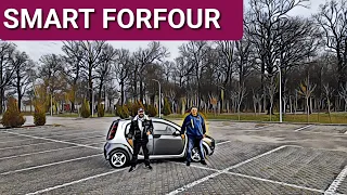 Doi bărbați cu greutate testează un Smart ForFour cu motor 11️⃣.5️⃣ cdi