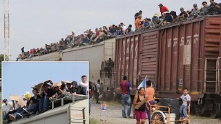 Hundreds of Central Americans Climbing Top of Lethal cargo train for Mexico-U.S.Border