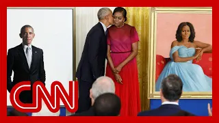 Barack Obama gives a speech after the unveiling of his White House portrait