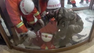 Firefighters Rescue Two Kids Stuck in Revolving Door in Northwest China